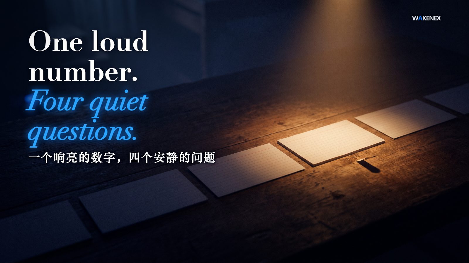A dark wooden desk holds a row of five plain blank cards; a single shaft of warm light picks out one of them while the other four sit in shadow. Headline: One loud number. Four quiet questions.